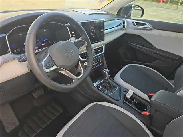 new 2025 Volkswagen Taos car, priced at $27,459