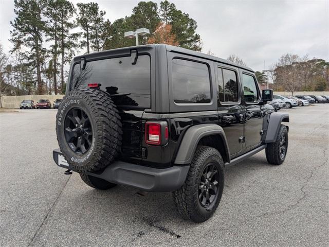 used 2021 Jeep Wrangler Unlimited car, priced at $30,900