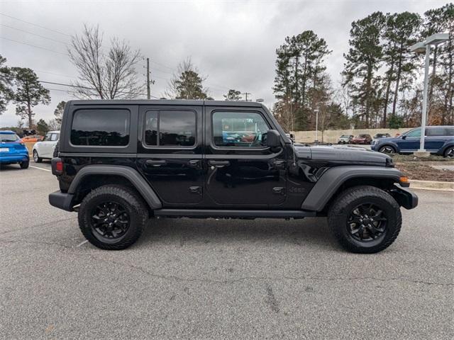 used 2021 Jeep Wrangler Unlimited car, priced at $30,900