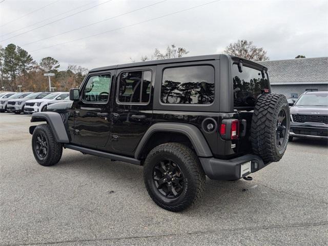 used 2021 Jeep Wrangler Unlimited car, priced at $30,900