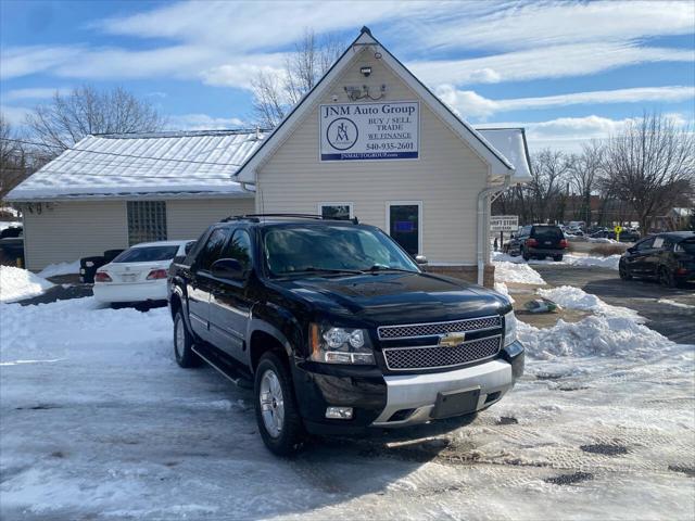 used 2011 Chevrolet Avalanche car, priced at $13,995