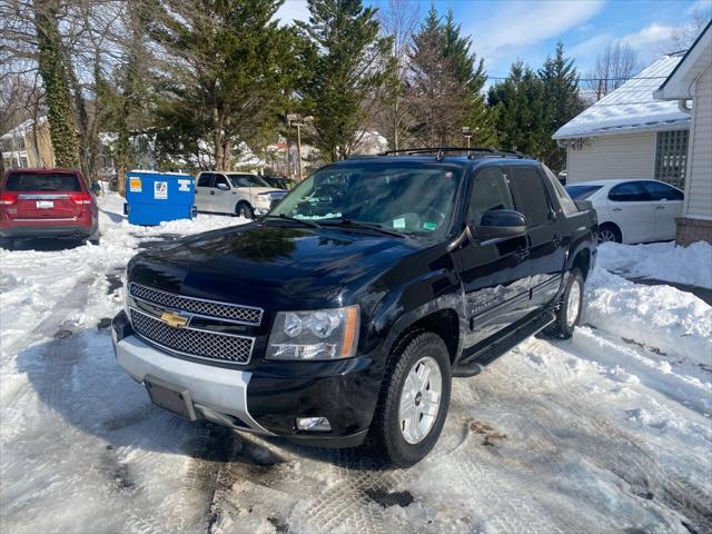 used 2011 Chevrolet Avalanche car, priced at $13,995