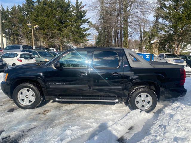 used 2011 Chevrolet Avalanche car, priced at $13,995