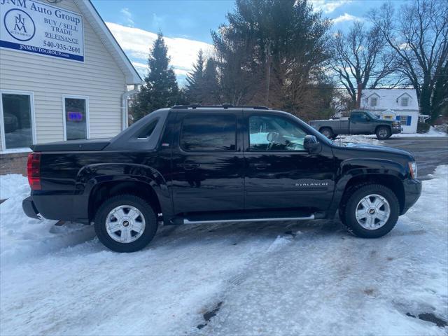 used 2011 Chevrolet Avalanche car, priced at $13,995