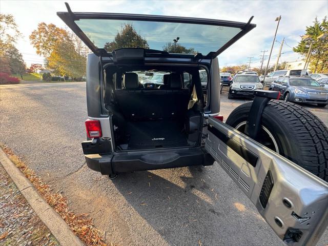 used 2013 Jeep Wrangler Unlimited car, priced at $18,995