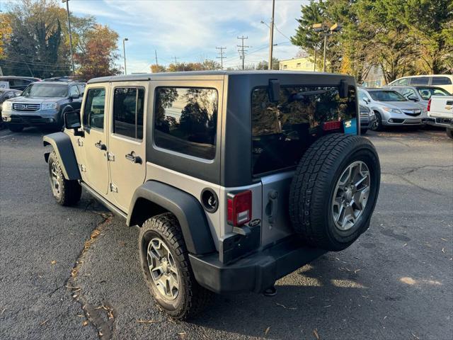 used 2013 Jeep Wrangler Unlimited car, priced at $18,995