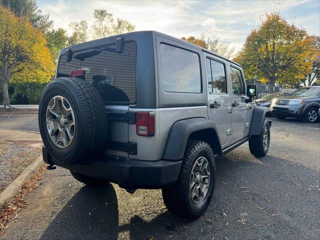 used 2013 Jeep Wrangler Unlimited car, priced at $18,995