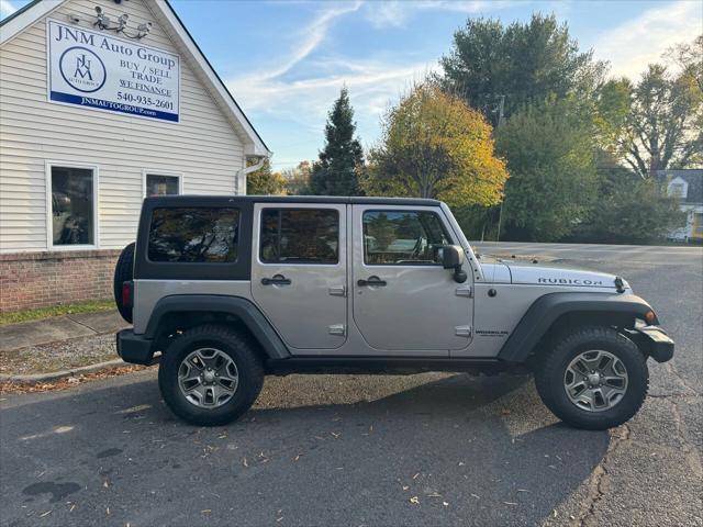 used 2013 Jeep Wrangler Unlimited car, priced at $18,995