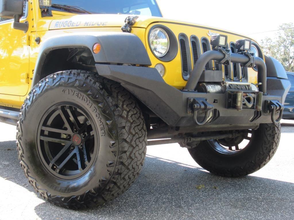 used 2015 Jeep Wrangler Unlimited car, priced at $24,887