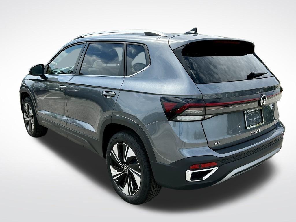 used 2025 Volkswagen Taos car, priced at $25,995