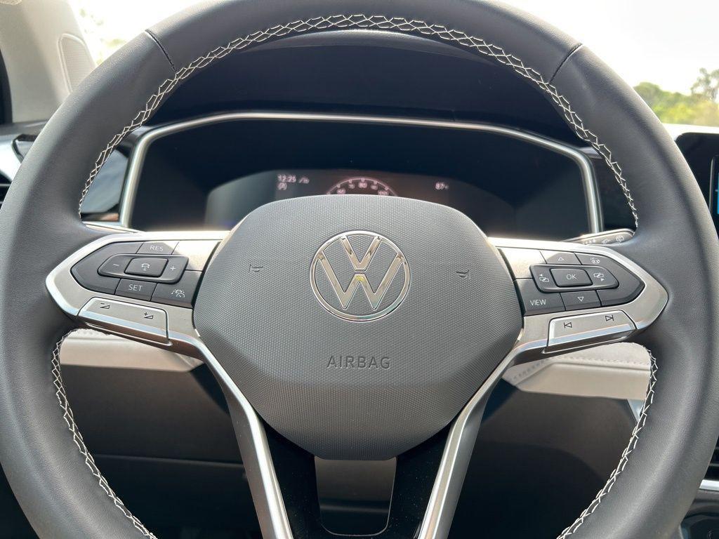 used 2025 Volkswagen Taos car, priced at $25,995