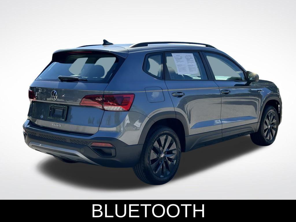 used 2023 Volkswagen Taos car, priced at $19,306
