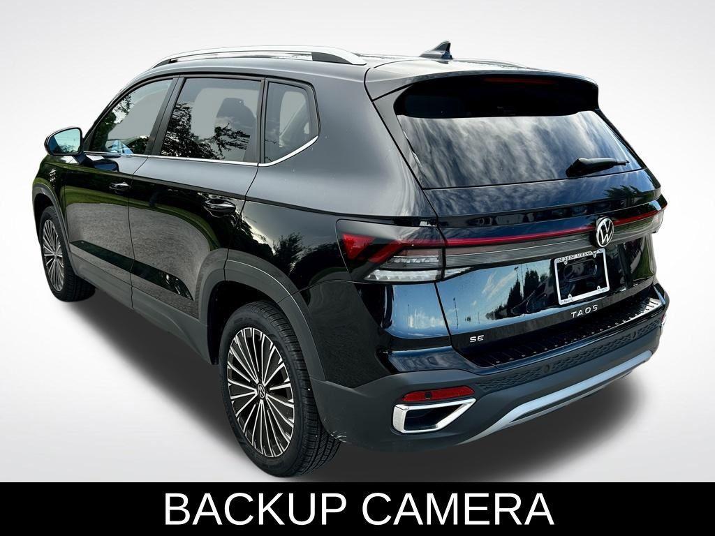 used 2025 Volkswagen Taos car, priced at $23,595