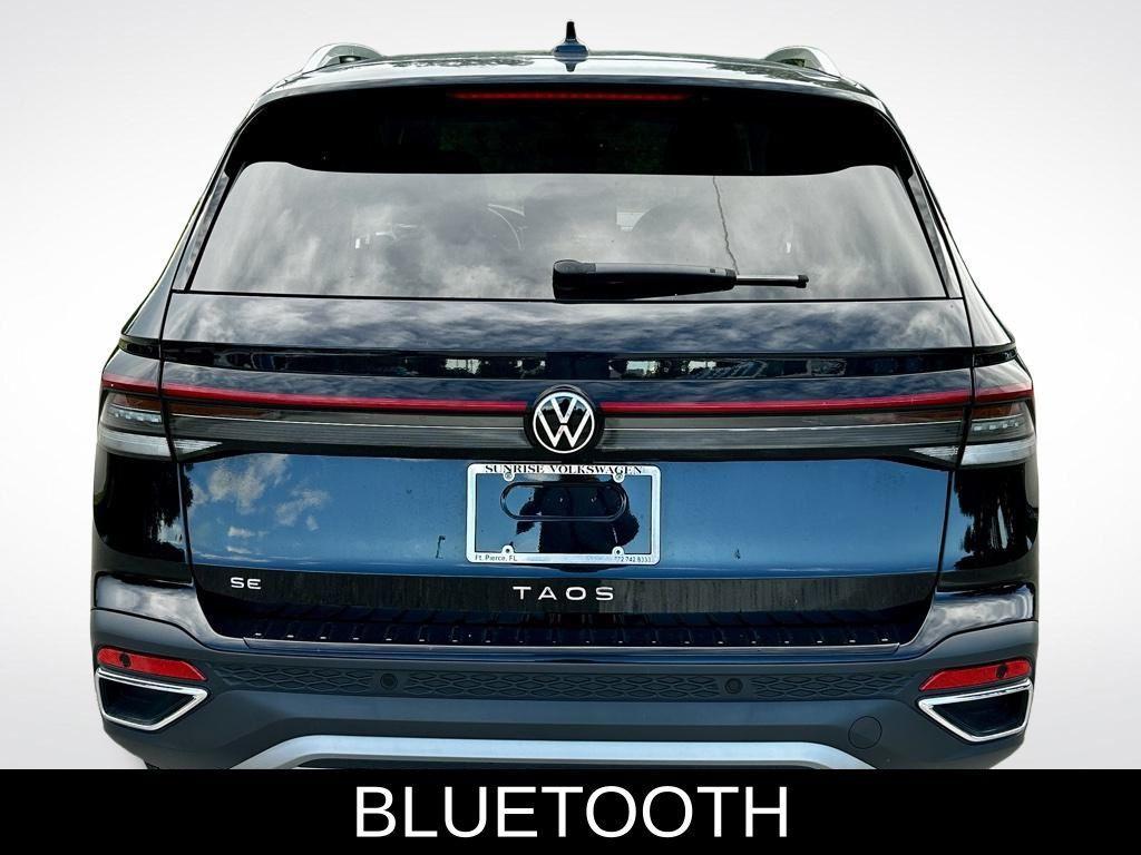 used 2025 Volkswagen Taos car, priced at $23,595
