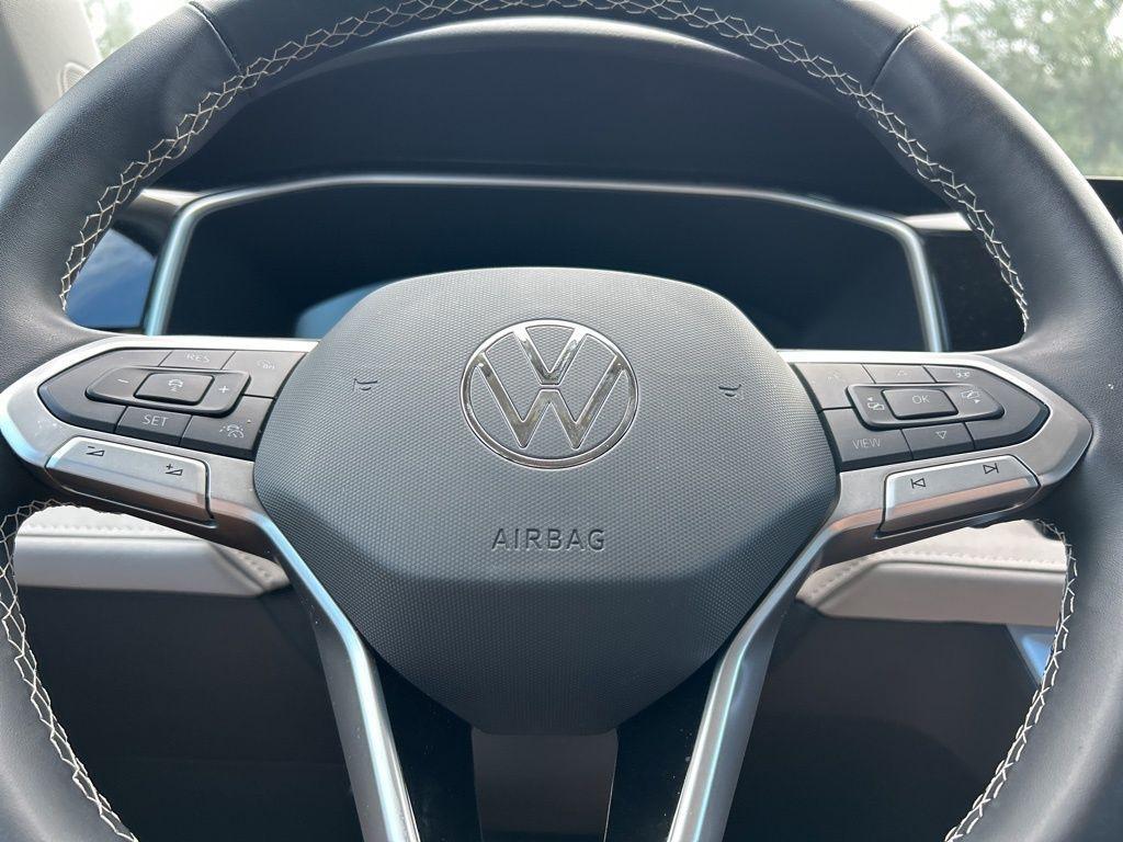 used 2025 Volkswagen Taos car, priced at $23,595
