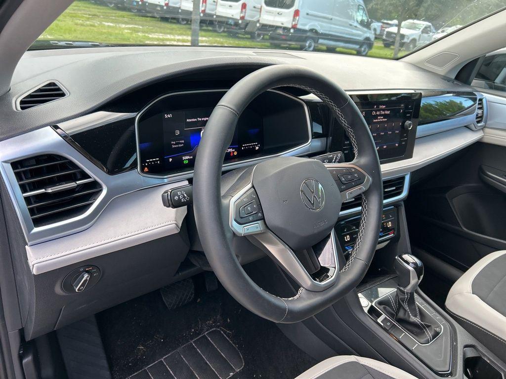 used 2025 Volkswagen Taos car, priced at $23,595