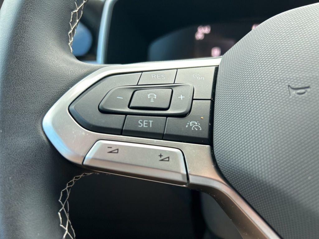 used 2025 Volkswagen Taos car, priced at $23,595