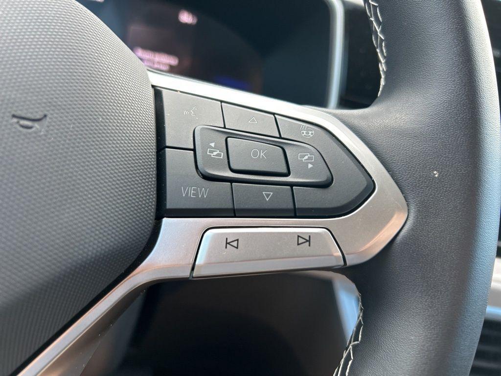 used 2025 Volkswagen Taos car, priced at $23,595