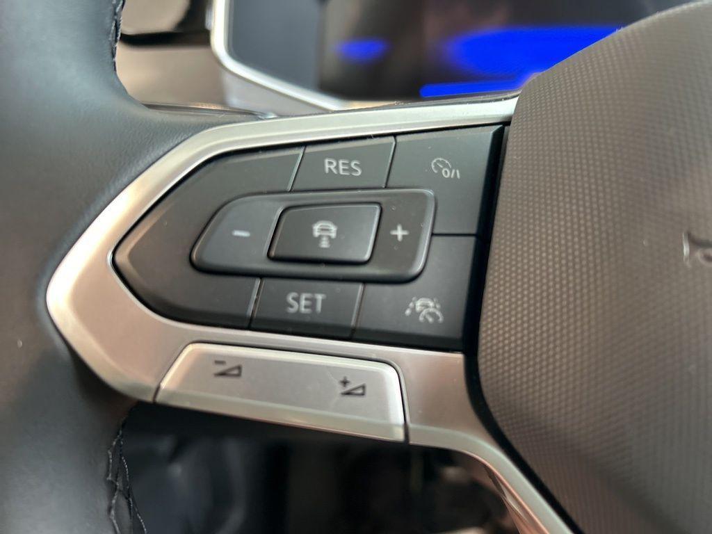 used 2025 Volkswagen Taos car, priced at $25,995