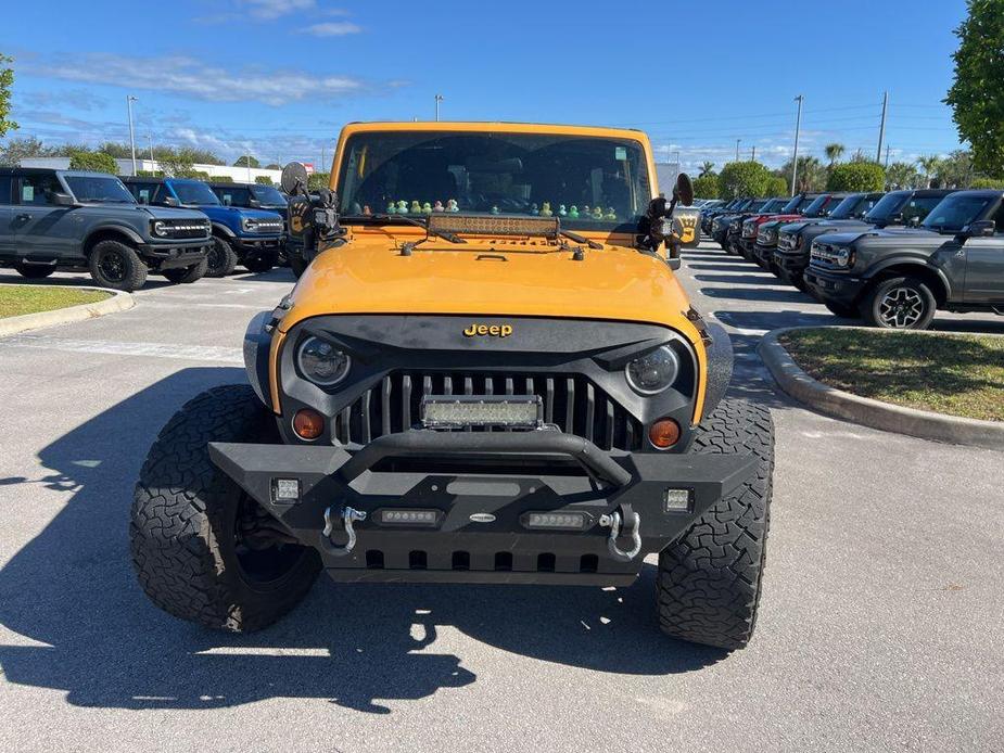 used 2012 Jeep Wrangler Unlimited car, priced at $11,999