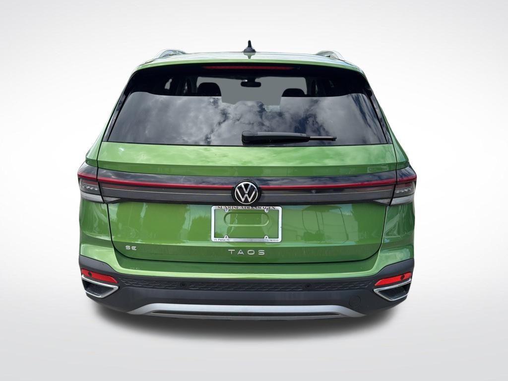 used 2025 Volkswagen Taos car, priced at $26,198