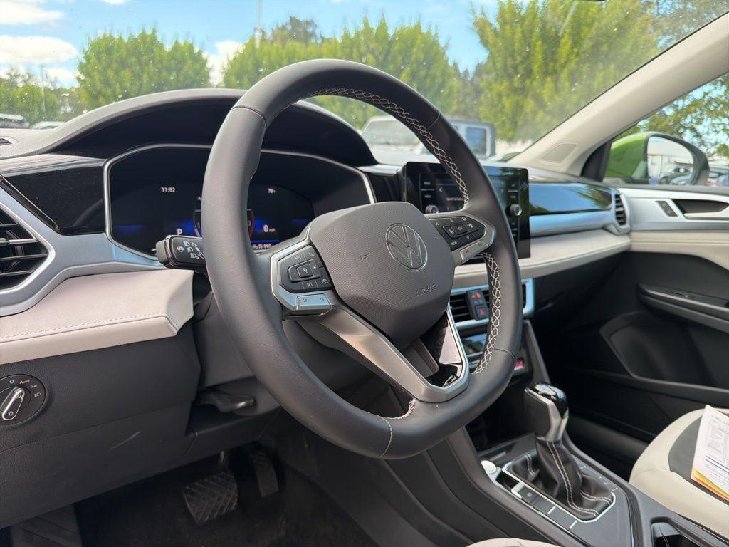 used 2025 Volkswagen Taos car, priced at $26,198