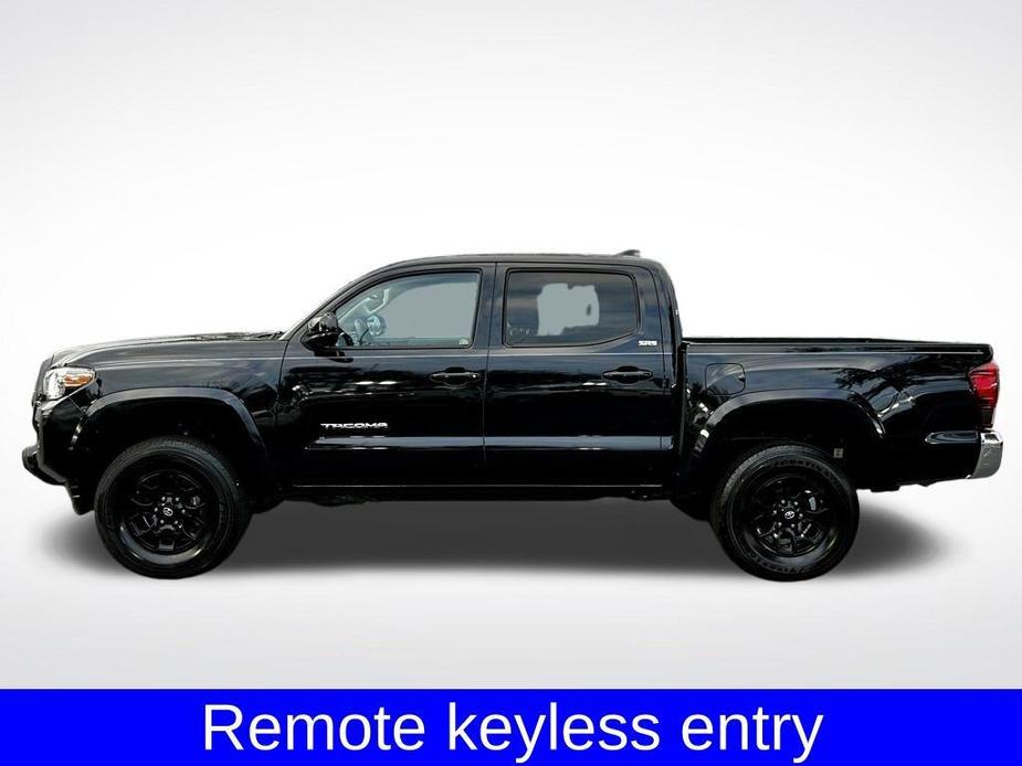 used 2021 Toyota Tacoma car, priced at $25,621