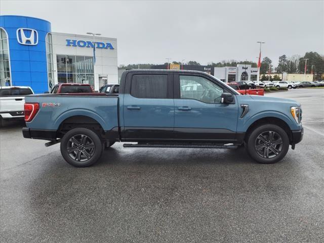 used 2023 Ford F-150 car, priced at $48,270