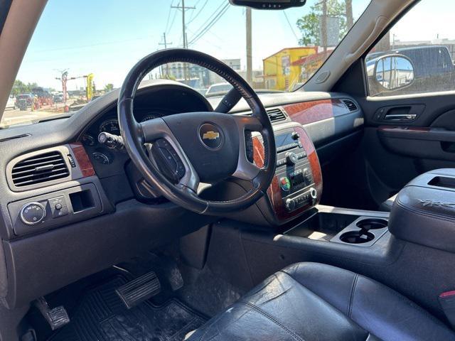 used 2013 Chevrolet Suburban car, priced at $14,000