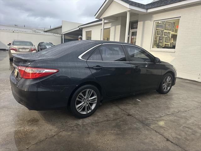 used 2015 Toyota Camry car, priced at $6,900