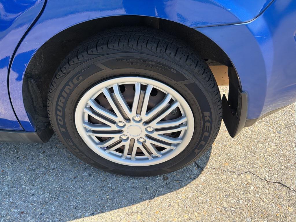 used 2009 Nissan Versa car, priced at $4,500