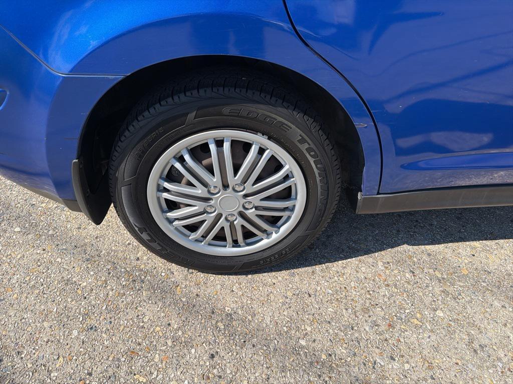used 2009 Nissan Versa car, priced at $4,500