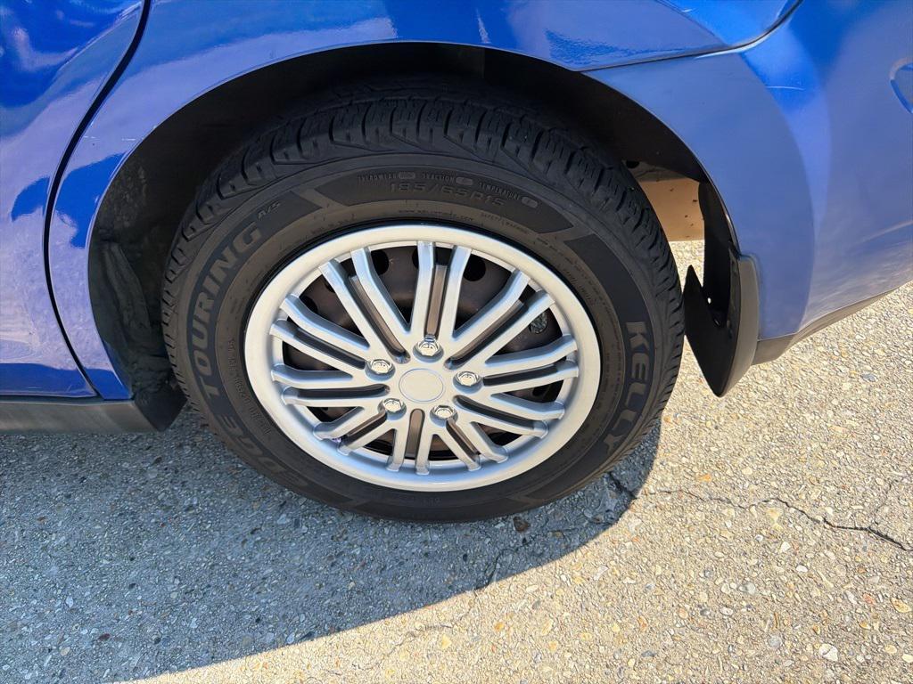 used 2009 Nissan Versa car, priced at $4,500