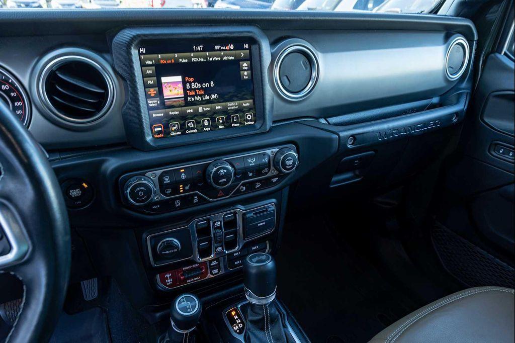 used 2021 Jeep Wrangler Unlimited car, priced at $38,571