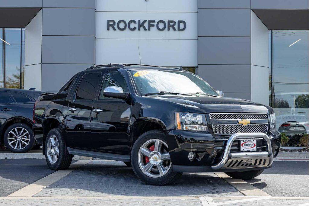 used 2013 Chevrolet Avalanche car, priced at $21,990