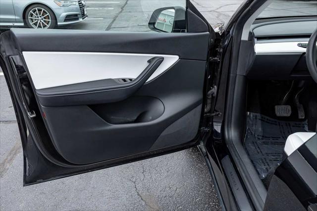 used 2020 Tesla Model Y car, priced at $25,599