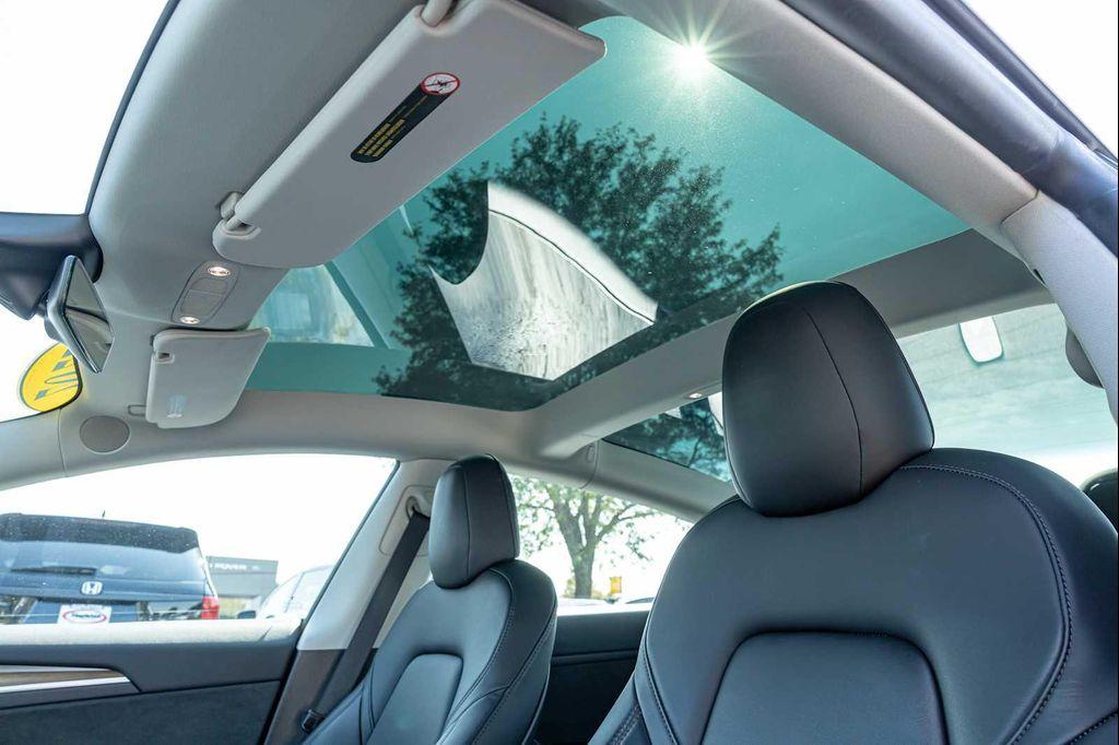 used 2022 Tesla Model 3 car, priced at $27,499