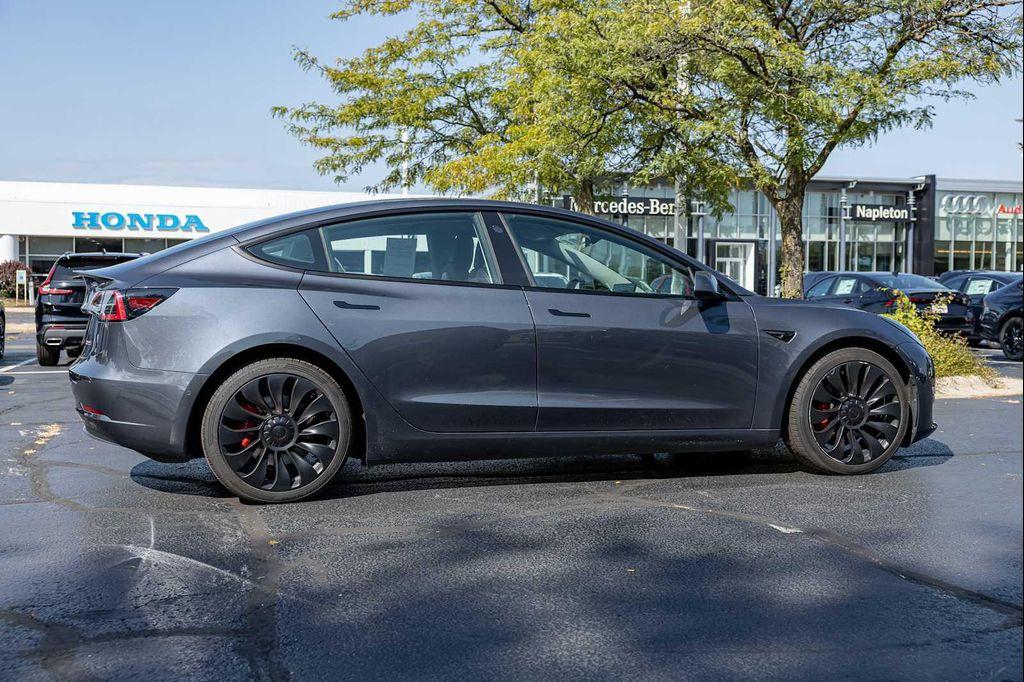 used 2022 Tesla Model 3 car, priced at $27,499