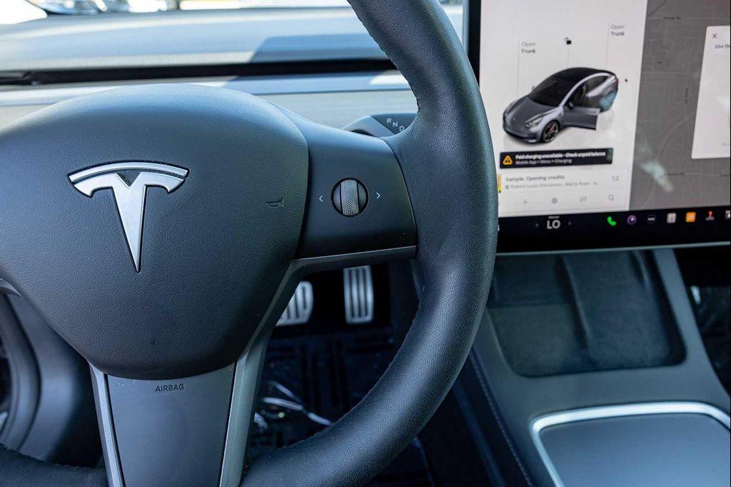used 2022 Tesla Model 3 car, priced at $27,499