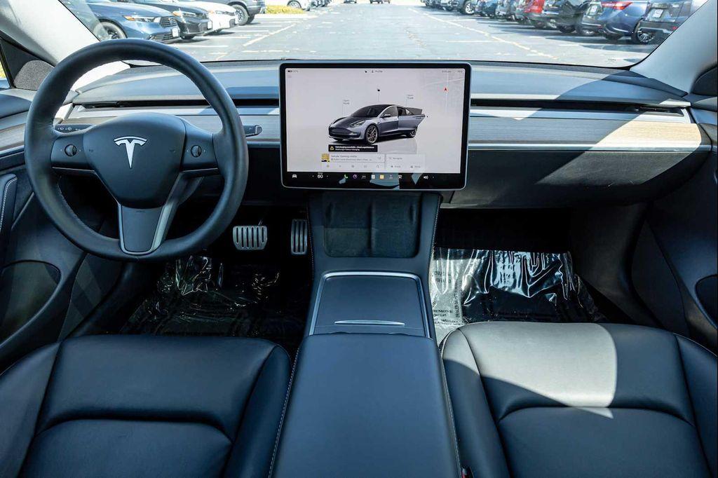 used 2022 Tesla Model 3 car, priced at $27,499