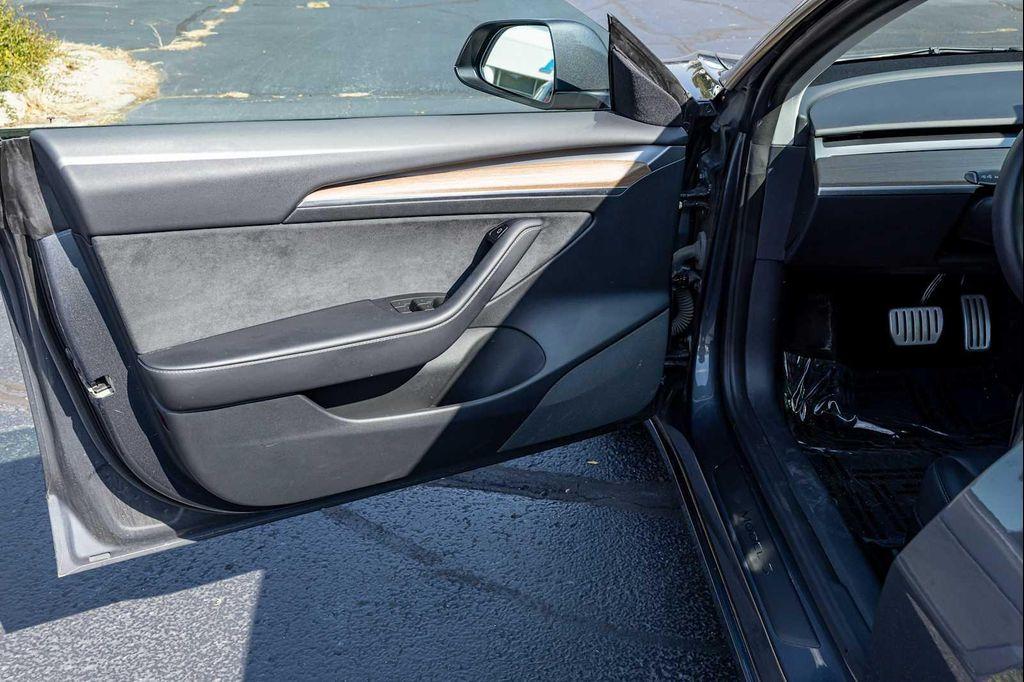 used 2022 Tesla Model 3 car, priced at $27,499