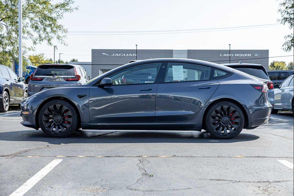 used 2022 Tesla Model 3 car, priced at $27,499