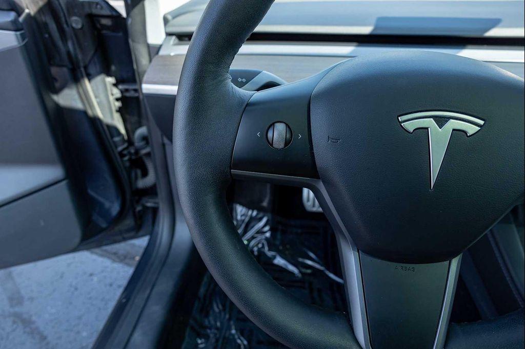 used 2022 Tesla Model 3 car, priced at $27,499