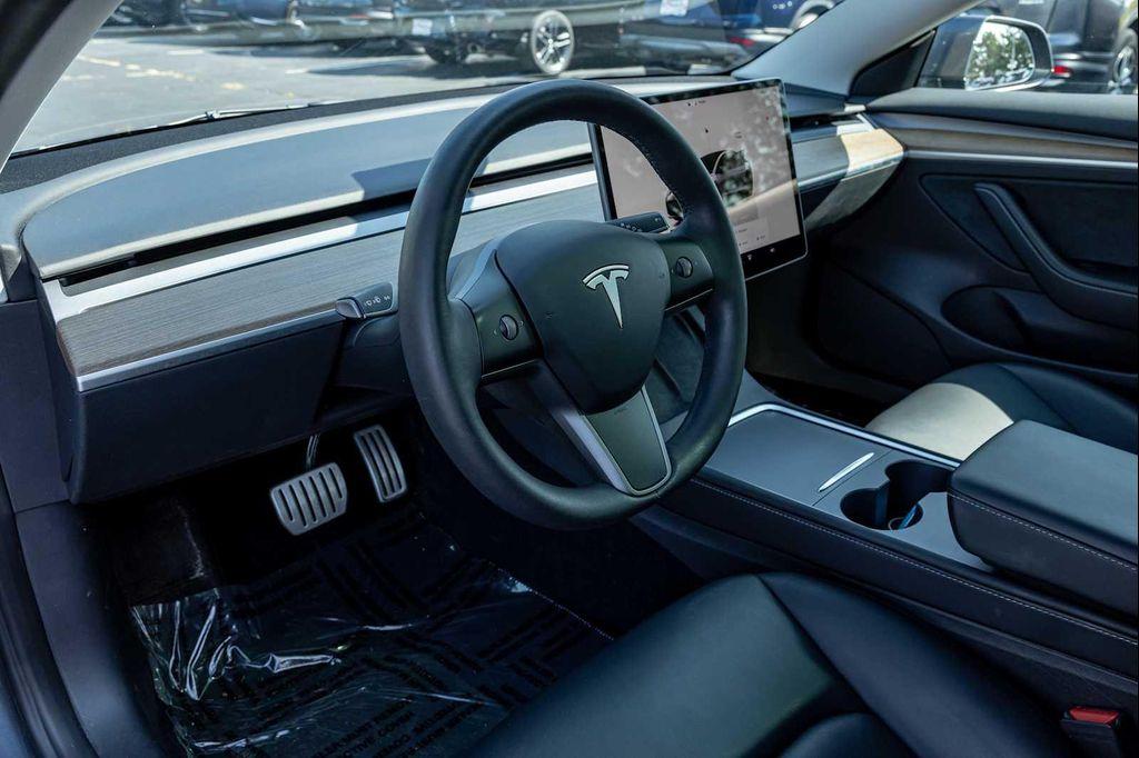 used 2022 Tesla Model 3 car, priced at $27,499