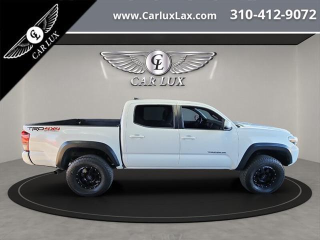 used 2018 Toyota Tacoma car, priced at $26,699