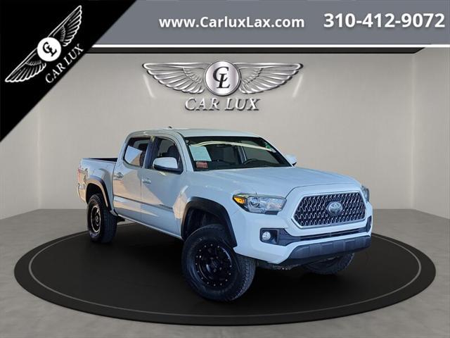 used 2018 Toyota Tacoma car, priced at $26,699