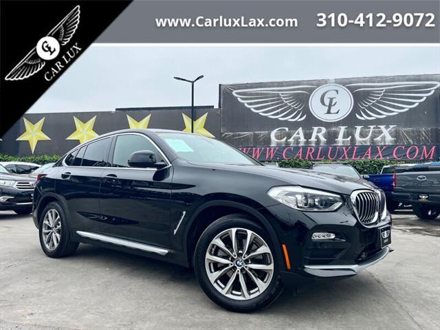 used 2019 BMW X4 car, priced at $26,488