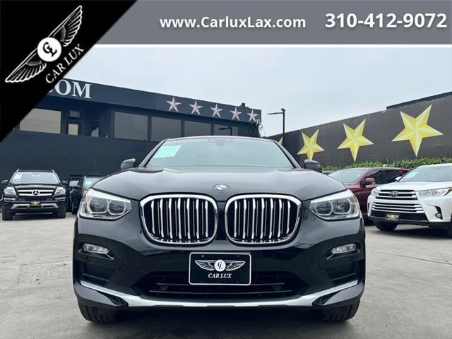 used 2019 BMW X4 car, priced at $26,488