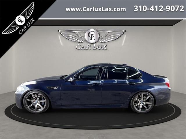 used 2014 BMW M5 car, priced at $33,988