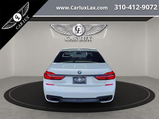 used 2019 BMW 750 car, priced at $32,988